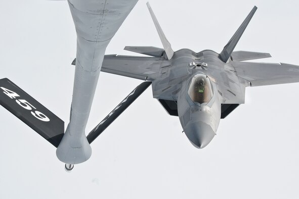 A 1st Fighter Wing F-22 Raptor comes in on approach to a refueling boom of 459th Air Refueling Wing KC-135R Stratotanker May 20, 2016. The 459th flew a congressional delegation from Moody Air Force Base, Ga., where they witnessed an air power demonstration, back to the National Capital Region. On the return leg, the distinguished travelers were able to witness the in-flight refueling. (U.S. Air Force photo/Staff Sgt. Kat Justen)