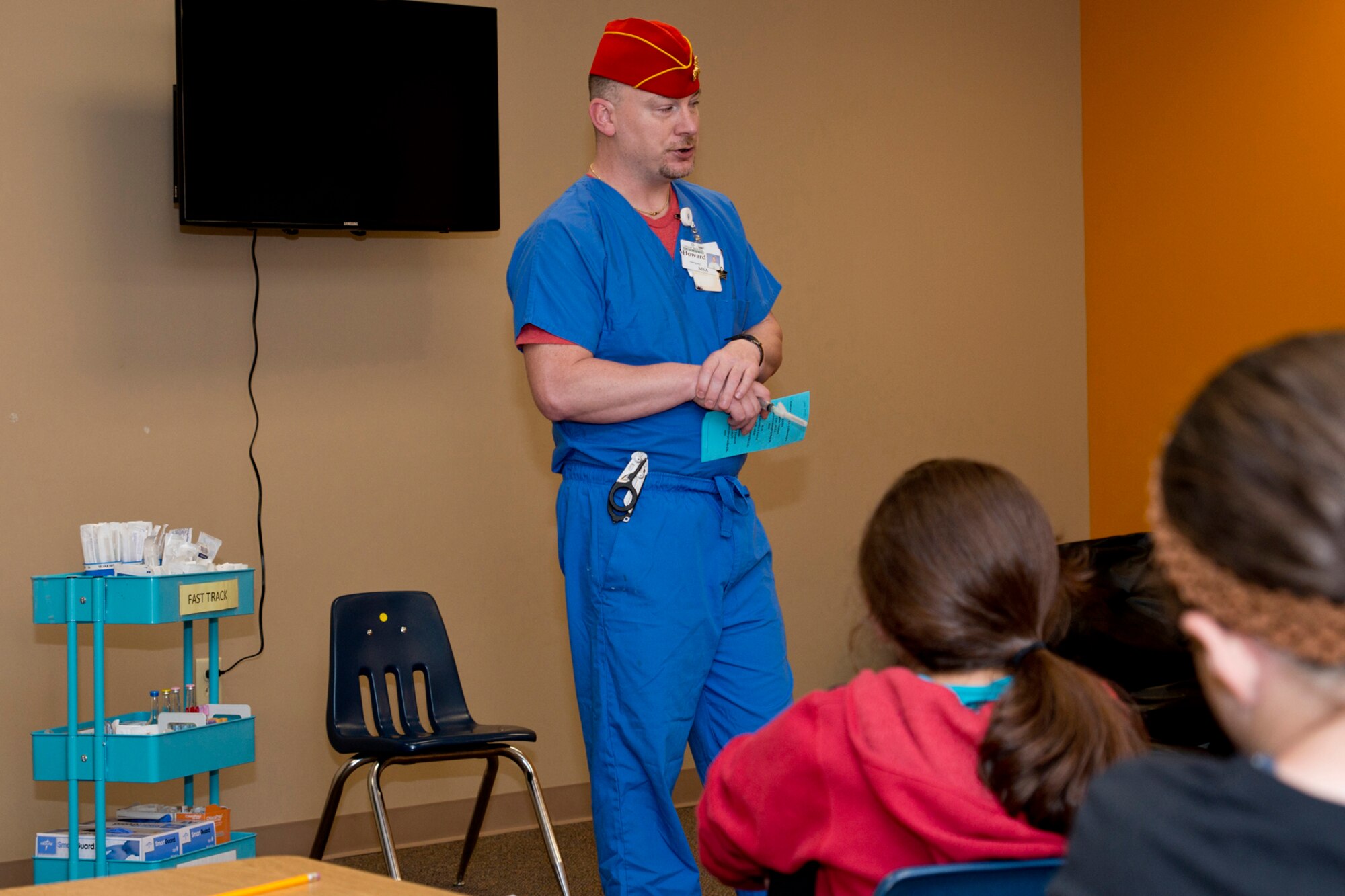Howard Katchur, an emergency room multi-skilled assistant, Conway Regional Health System, briefs a group of students from Julia Lee Moore Elementary School, about a career in medicine during the Fourth Grade Elementary Career Fair held at the Second Baptist Church in Conway Ark., May 17, 2016. The event exposed more than 250 students to careers they might not have considered and the level of education those careers may require. (U.S. Air Force photo by Master Sgt. Jeff Walston/Released)  