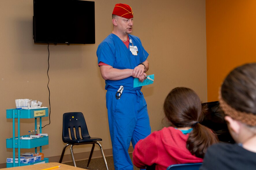 Howard Katchur, an emergency room multi-skilled assistant, Conway Regional Health System, briefs a group of students from Julia Lee Moore Elementary School, about a career in medicine during the Fourth Grade Elementary Career Fair held at the Second Baptist Church in Conway Ark., May 17, 2016. The event exposed more than 250 students to careers they might not have considered and the level of education those careers may require. (U.S. Air Force photo by Master Sgt. Jeff Walston/Released)  