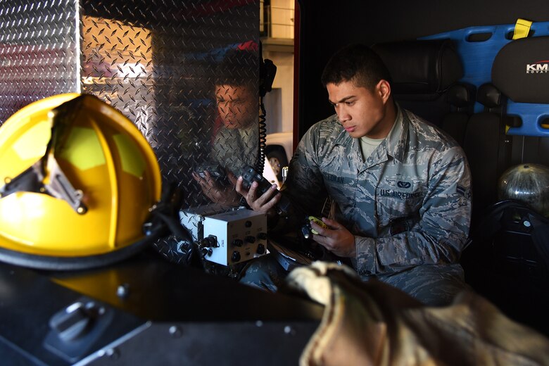 PETERSON AIR FORCE BASE, Colo. – Airman 1st Class Fred Lokan, a 21st Civil Engineer Squadron firefighter, conducts a check on all radio communications in the Fire Station at Peterson Air Force Base, Colo., on May 21, 2016. Lokan is from the village of Masausi on the island of American Samoa. (U.S. Air Force photo by Airman 1st Class Dennis Hoffman)