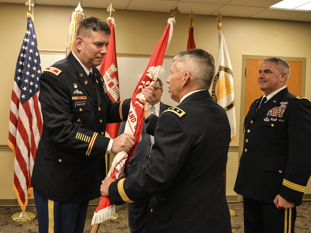 Col. Benjamin J. Bigelow accepts the flag from Lt. Gen. Todd T. Semonite, Chief of Engineers, to  assume command of the U.S. Army Corps of Engineers’ Great Lakes and Ohio River Division from outgoing commander Brig. Gen. Richard G. Kaiser during a ceremony here in Cincinnati, OH on May 24, 2016.
