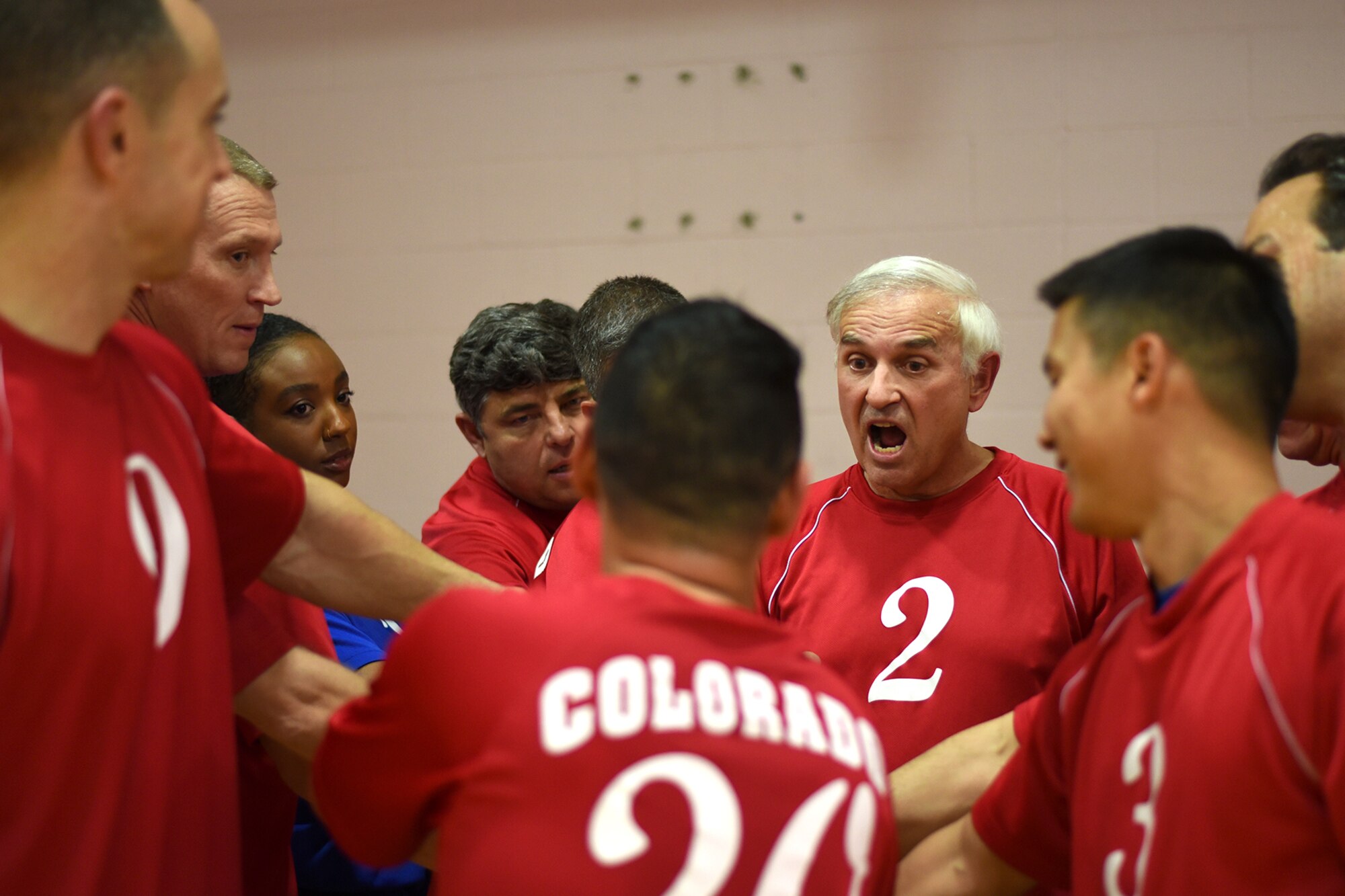 PETERSON AIR FORCE BASE, Colo. – Ski Wagasky, J3 deputy branch chief and the NORAD/U.S. Northern Command captain, delivers a pre-game speech to his team before the championship match in the Peterson Fitness Center on May 18, 2016. The NORAD/U.S. Northcom intramural volleyball team were the lunch league champions and the 21st Space Wing Staff Agency intramural volleyball team were the night league champions. The WSA team won all three matches. (U.S. Air Force photo by Airman 1st Class Dennis Hoffman)