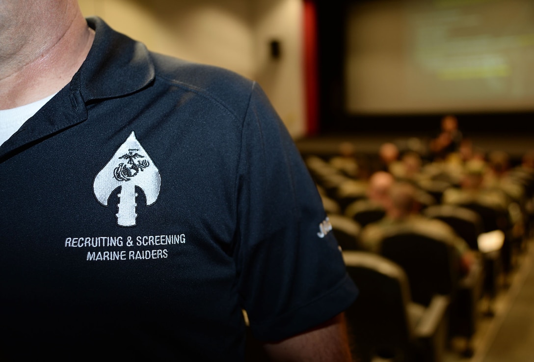 Marines throughout Marine Corps Logistics Base Albany, Ga., listens to a brief from members of the Marine Corps Forces Special Operations Command Screening Team at the Base Theater, here, May 18. The HMST members briefed and explained the requirements and process for joining MARSOC, as well as gave an overview of MARSOC and its missions and operations.