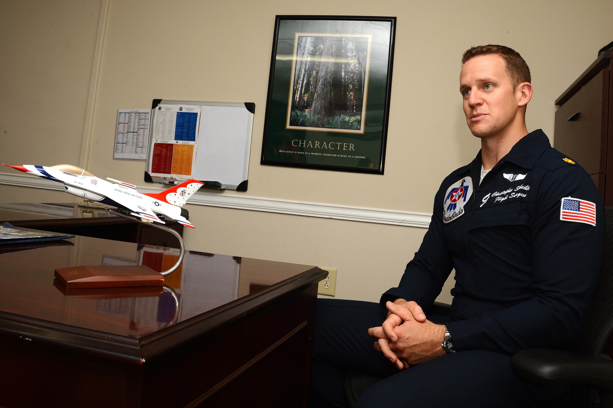 U.S. Air Force Maj. Christopher Scheibler, U.S. Air Force Air Demonstration Squadron flight surgeon, gives a ‘G’ force breathing brief at Shaw Air Force Base, S.C., May 17, 2016. Scheibler taught Christopher Geddings, Sumter City fire department engineer, how to deal with the ‘G’ forces he would encounter during his hometown hero flight. (U.S. Air Force photo by Senior Airman Jonathan Bass)