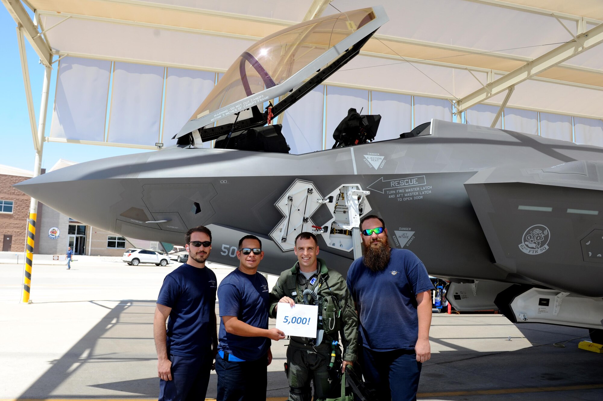 Lt. Col. Gregory Frana, 62nd Fighter Squadron commander, celebrates May 19, 2016, at Luke Air Force Base after flying Luke's 5000th F-35 sortie. (U.S. Air Force photo by Airman 1st Class Pedro Mota)
