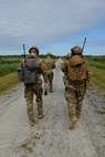 Joint terminal attack controllers, assigned to the 25th Air Support Operations Squadron, hike to a control tower during exercise Razor Talon, May 20, 2016, at Dare County Bombing Range, North Carolina. Their goal was to train in an anti-access/area denial scenario, to utilize the full combat capability of the 25th ASOS to include JTACs, joint fires observers and air support operations center personnel. (U.S. Air Force photo by Airman 1st Class Ashley Williamson/Released)