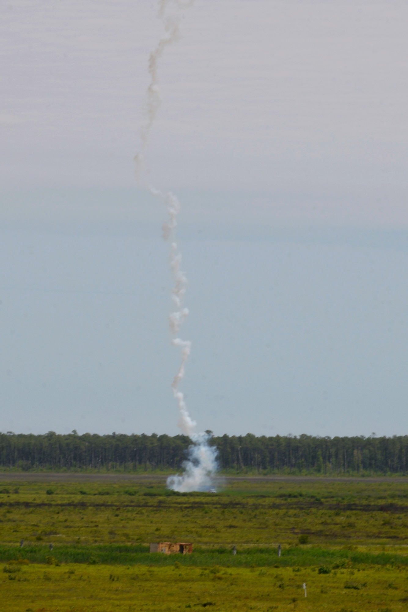 Exercise organizers fire a simulated surface-to-air missile at an incoming aircraft during Razor Talon, May 20, 2016, at Dare County Bombing Range, North Carolina. Joint terminal attack controllers, joint fires observers and air support operations center personnel, assigned to the 25th Air Support Operations Squadron and 25th Infantry Division, Schofield Barracks, Hawaii, participated in the exercise for the first time. (U.S. Air Force photo by Airman 1st Class Ashley Williamson/Released)