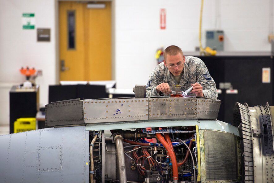 U.S. Air Force Tech. Sgt. Matthew Cohen, 23d Maintenance Group quality assurance inspector, performs an inspection on a TF-34 jet engine, May 24, 2016, at Moody Air Force Base, Ga. The TF-34 jet engine is used on the installation’s A-10C Thunderbolt II which is flown by the 74th and 75th Fighter Squadron. (U.S. Air Force photo by Airman 1st Class Greg Nash/Released)  