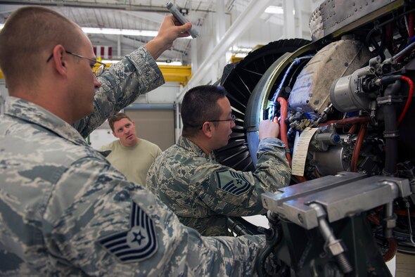 U.S. Air Force Tech. Sgt. Matthew Cohen, 23d Maintenance Group quality assurance inspector, shines light on a TF-34 jet engine for Master Sgt. Matthew Price, 23d Component Maintenance Squadron TF-34 jet engine intermediate maintenance section chief, during an inspection, May 24, 2016, at Moody Air Force Base, Ga. QA works in conjunction with maintenance units to communicate, identify, prevent and correct unsatisfactory conditions or elements which influence the acceptability of the final product for Moody’s aviation assets. (U.S. Air Force photo by Airman 1st Class Greg Nash/Released)  