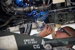 U.S. Air Force Tech. Sgt. Matthew Cohen, 23d Maintenance Group quality assurance inspector, scans the components of a TF-34 jet engine during an inspection, May 24, 2016, at Moody Air Force Base, Ga. QA inspectors ensure that aviation assets conform to established requirements throughout their life cycle for maximum serviceability. (U.S. Air Force photo by Airman 1st Class Greg Nash/Released)  