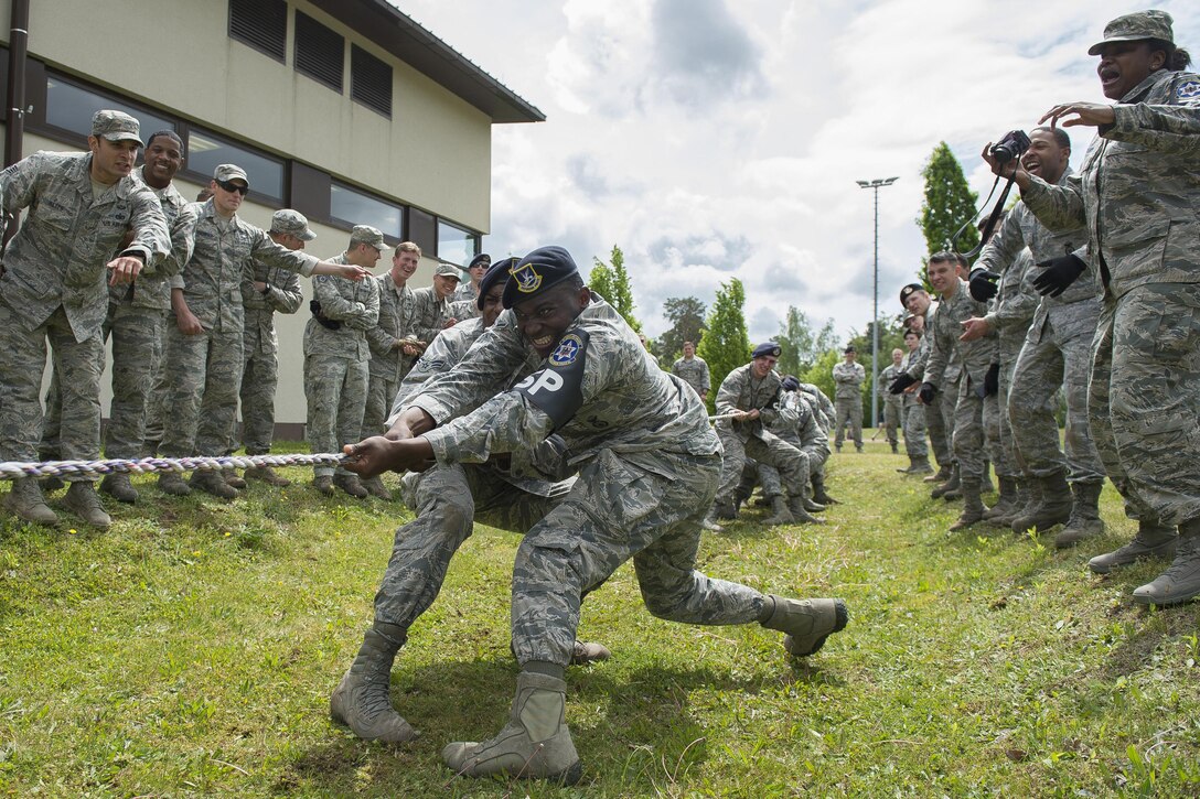 Airmen participate in a pushup challenge during the Battle of the Badges competition at Ramstein Air Base, Germany, May 19, 2016. The competition was an event during National Police Week, which recognizes law enforcement officers who lost their lives in the line of duty. Air Force photo by Senior Airman Damon Kasberg