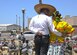 U.S. Airmen and civilians applaud as the Folklorico Dance Performance concludes during the Cultural Awareness Festival Breaking Through Barriers: Past, Present and Future at Davis-Monthan Air Force Base, Ariz., May 20, 2016. Cultural and special observances are conducted to enhance cross-cultural awareness and to promote diversity among all service members, civilian employees, contractors, family members and retirees. (U.S. Air Force photo by Airman Nathan H. Barbour/Released)