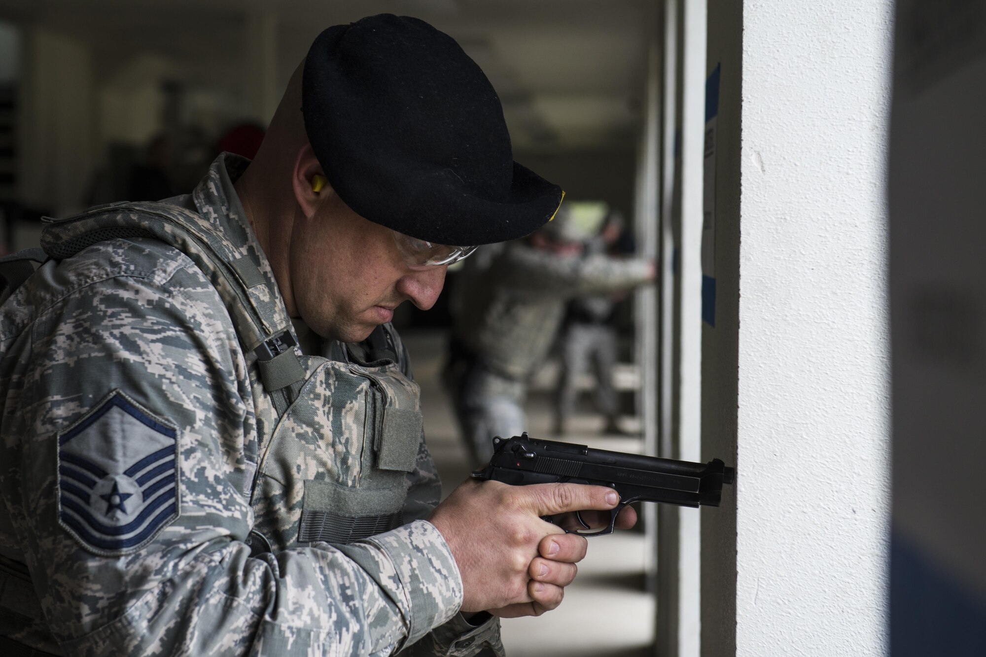 U.S. Air Force Master Sgt. Jeramy Lemons, the 213th Security Force Squadron training manager at Clear Air Force Station, waits for the start of a small arms competition at Eielson Air Force Base, Alaska, May 17, 2016, as part of National Police Week activities. The small arms competition was one of the main events for the week, along with equipment displays, a military working dog competition and the Fallen Heroes 5K Run/Ruck. (U.S. Air Force photo by Staff Sgt. Joshua Turner/Released)