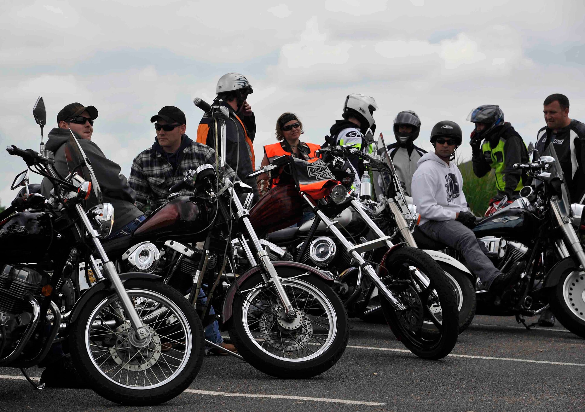 Members of Team McConnell wait outside during a Motorcycle Mentorship Ride, May 20, 2016, in Winfield, Kan.  Riders broke up into groups and covered several training modules before stopping for lunch and heading back to base. (U.S. Air Force photo/Airman Erin McClellan)