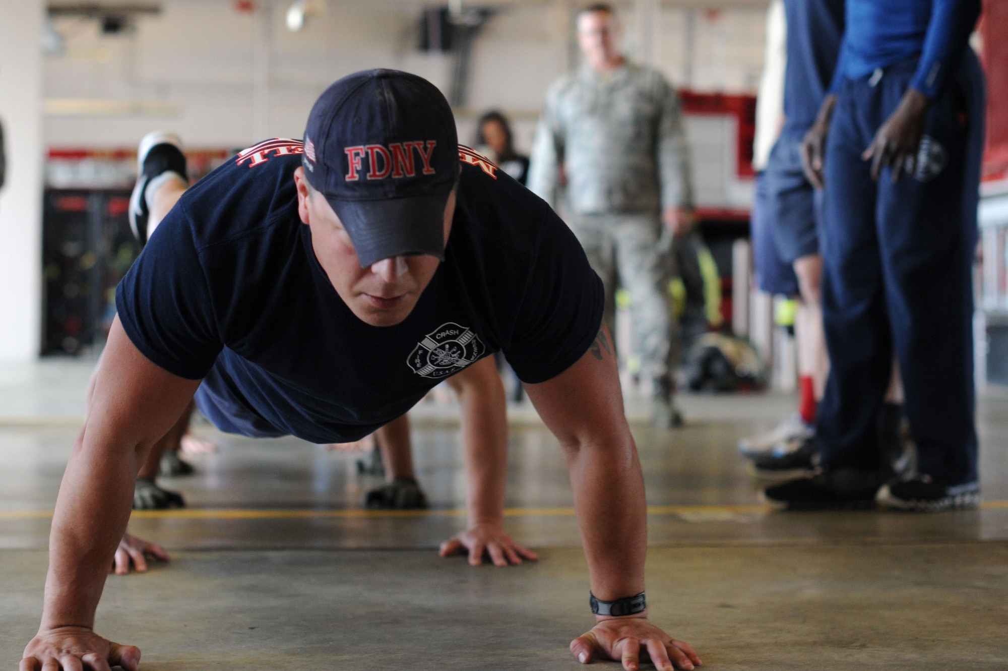 The 22nd Security Forces Squadron defenders and the 22nd Civil Engineer Squadron firefighters went head-to-head during the Battle of the Badges, May 19, 2016, at McConnell Air Force Base, Kan. Over the course of the day, the two groups competed in weightlifting, dodgeball, a fit challenge, basketball and flag football. (U.S. Air Force photos by Airman 1st Class Jenna K. Caldwell)
