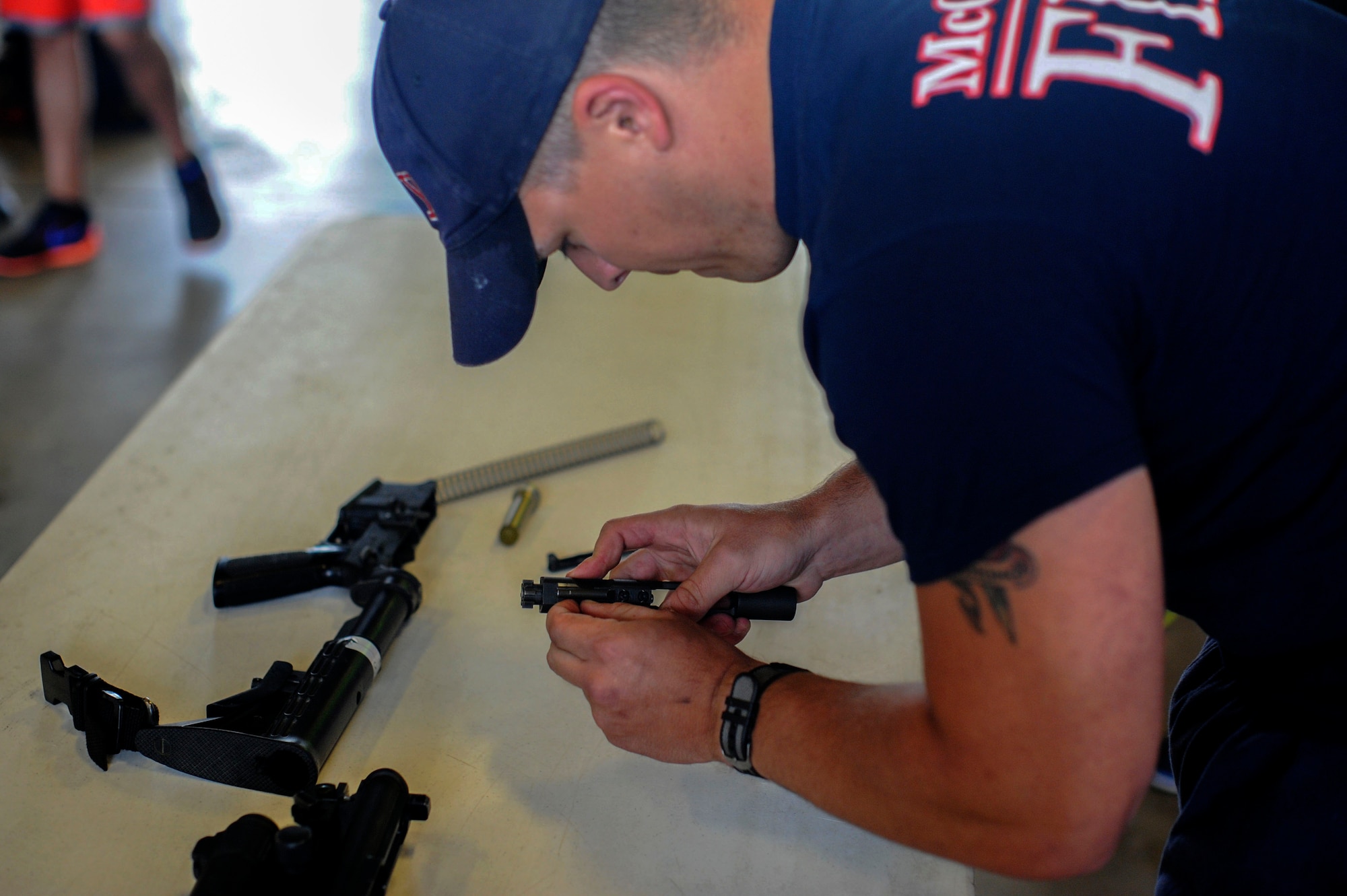 The 22nd Security Forces Squadron defenders and the 22nd Civil Engineer Squadron firefighters went head-to-head during the Battle of the Badges, May 19, 2016, at McConnell Air Force Base, Kan. Over the course of the day, the two groups competed in weightlifting, dodgeball, a fit challenge, basketball and flag football. (U.S. Air Force photos by Airman 1st Class Jenna K. Caldwell)