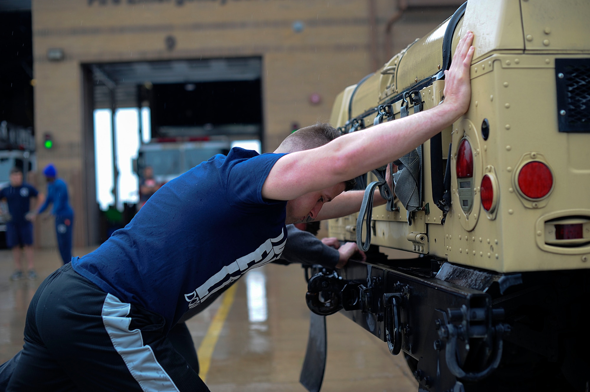 The 22nd Security Forces Squadron defenders and the 22nd Civil Engineer Squadron firefighters went head-to-head during the Battle of the Badges, May 19, 2016, at McConnell Air Force Base, Kan. Over the course of the day, the two groups competed in weightlifting, dodgeball, a fit challenge, basketball and flag football. (U.S. Air Force photos by Airman 1st Class Jenna K. Caldwell)