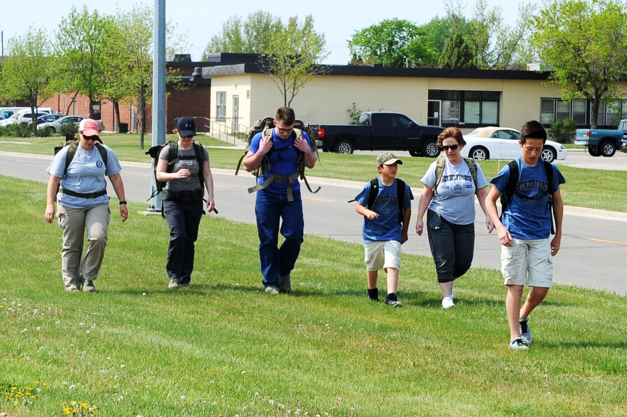Minot Air Force Base, N.D., observed National Police Week from May 15-20. During Police Week, various events ranging from a flag football tournament, a simulated 9mm pistol shoot, a ruck march around base, a 5k memorial run and a top cop challenge, where different security forces unit’s on base were able to show off their skills of what their unit brings to the table. Police Week ended with a ceremony paying homage to those lost in the line of duty. (U.S. Air Force photo/Senior Airman Kristoffer Kaubisch)