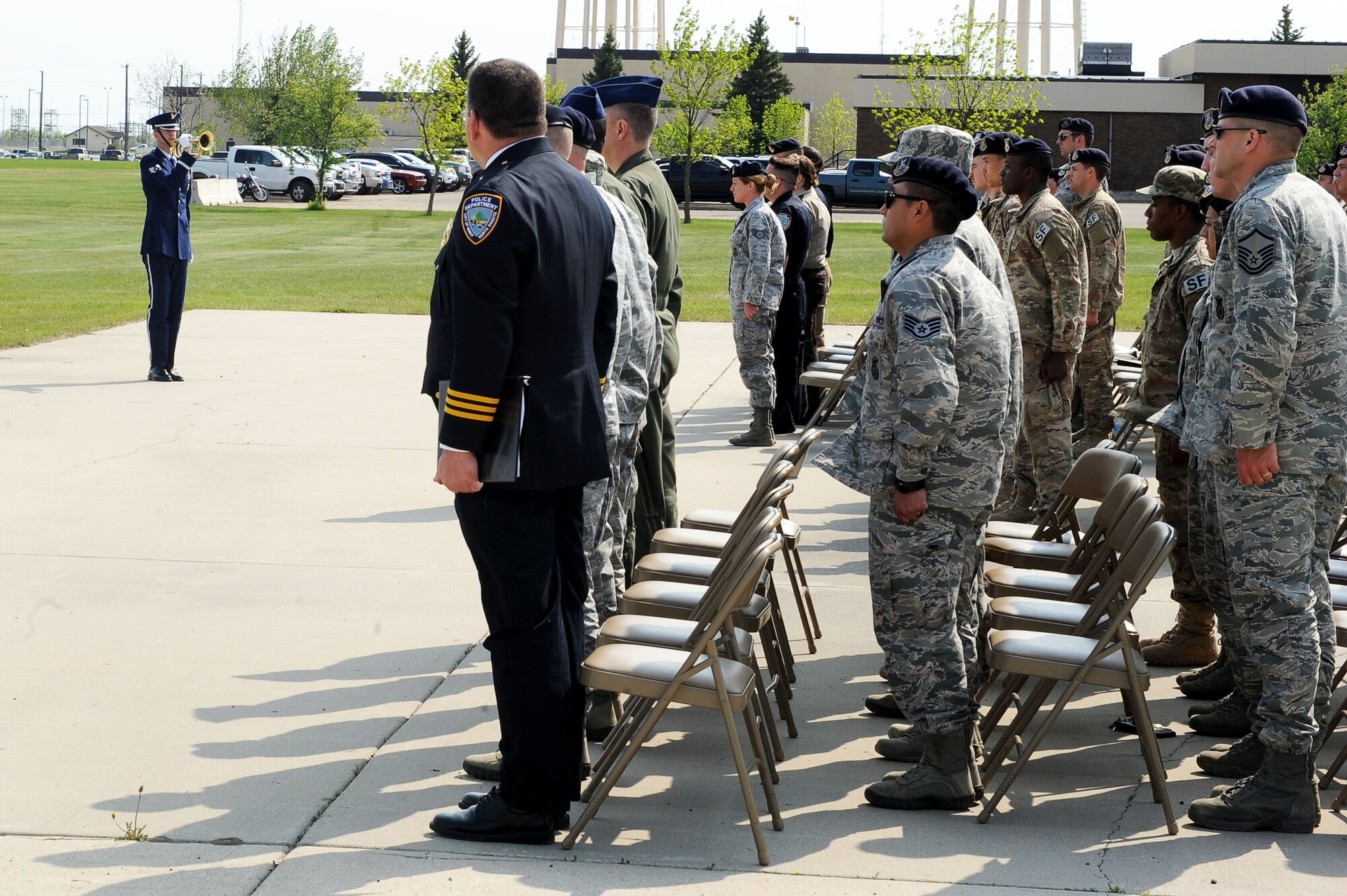 Minot Air Force Base, N.D., observed National Police Week from May 15-20. During Police Week, various events ranging from a flag football tournament, a simulated 9mm pistol shoot, a ruck march around base, a 5k memorial run and a top cop challenge, where different security forces unit’s on base were able to show off their skills of what their unit brings to the table. Police Week ended with a ceremony paying homage to those lost in the line of duty. (U.S. Air Force photo/Senior Airman Kristoffer Kaubisch)