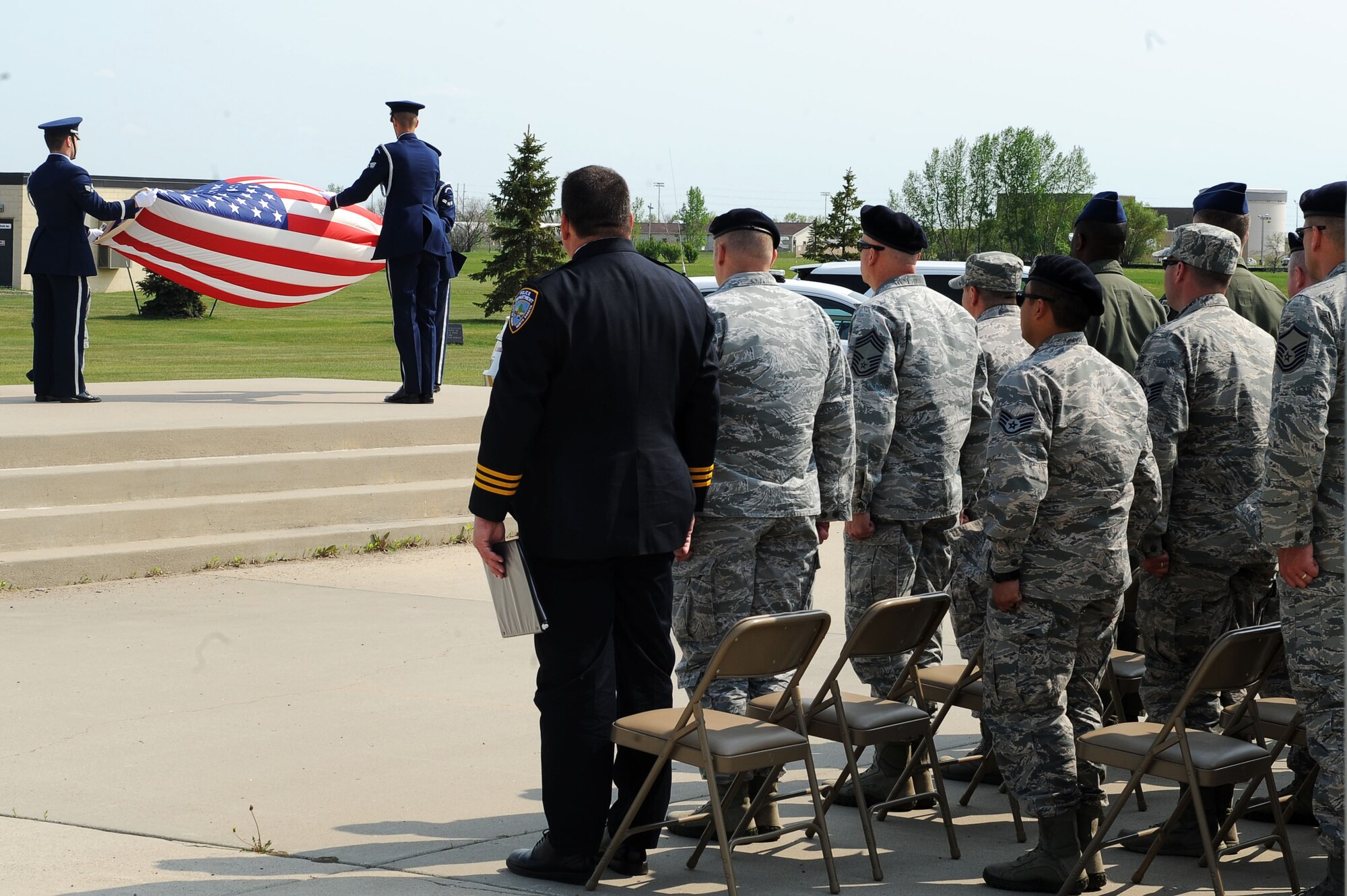 Minot Air Force Base, N.D., observed National Police Week from May 15-20. During Police Week, various events ranging from a flag football tournament, a simulated 9mm pistol shoot, a ruck march around base, a 5k memorial run and a top cop challenge, where different security forces unit’s on base were able to show off their skills of what their unit brings to the table. Police Week ended with a ceremony paying homage to those lost in the line of duty. (U.S. Air Force photo/Senior Airman Kristoffer Kaubisch)