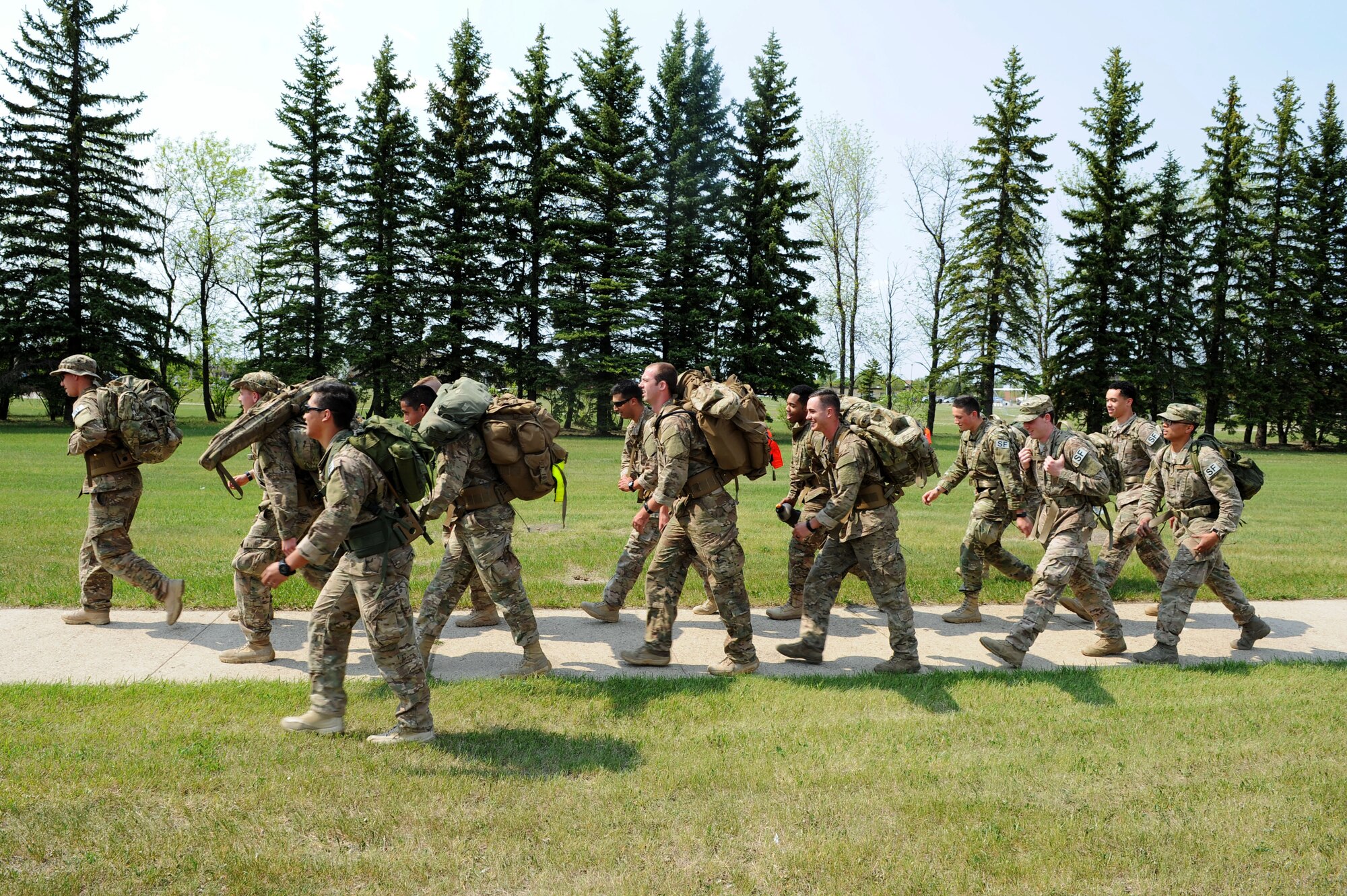 Minot Air Force Base, N.D., observed National Police Week from May 15-20. During Police Week, various events ranging from a flag football tournament, a simulated 9mm pistol shoot, a ruck march around base, a 5k memorial run and a top cop challenge, where different security forces unit’s on base were able to show off their skills of what their unit brings to the table. Police Week ended with a ceremony paying homage to those lost in the line of duty. (U.S. Air Force photo/Senior Airman Kristoffer Kaubisch)
