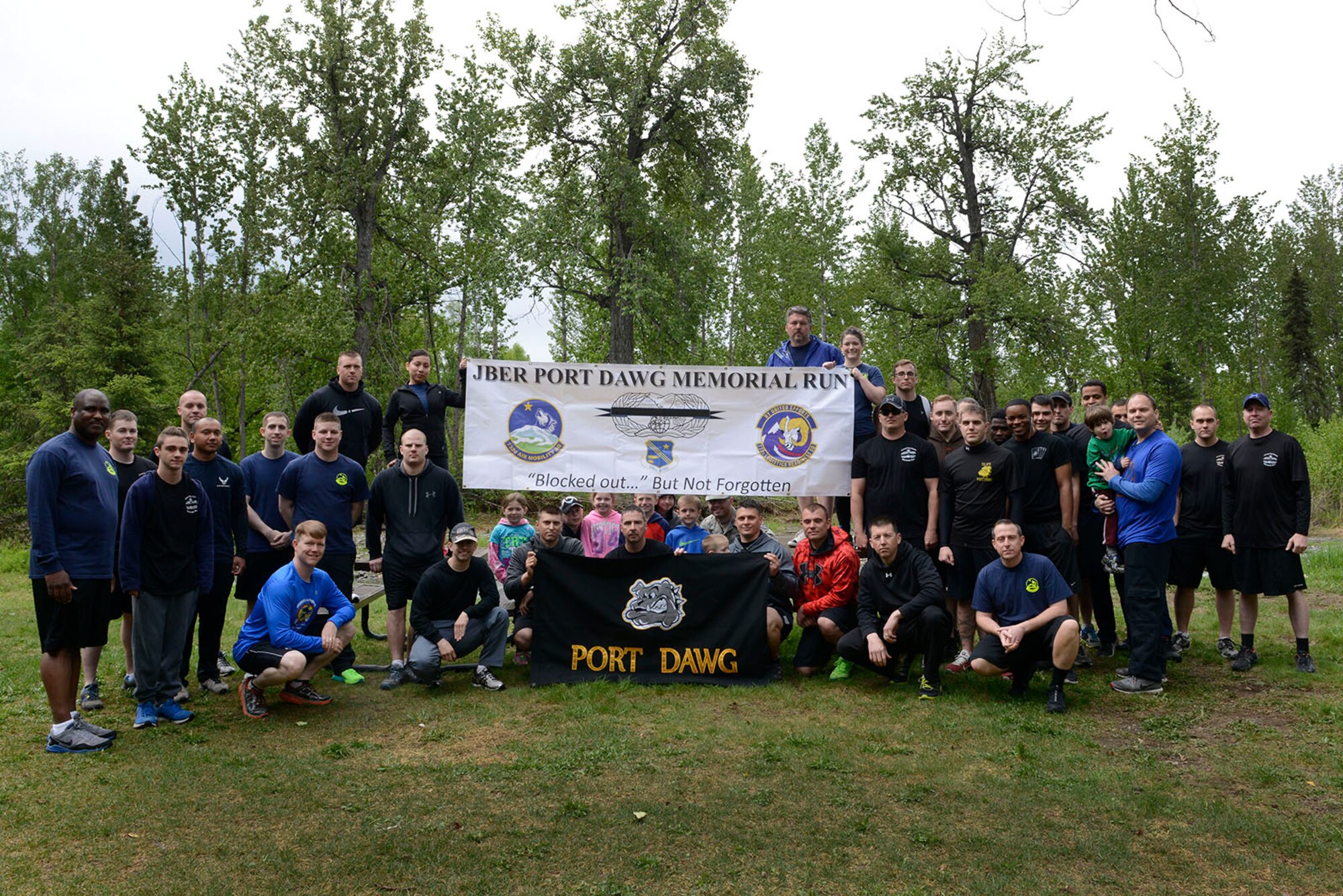 Air transportation Airmen from Joint Base Elmendorf-Richardson participate in a Port Dawg Memorial 5k run May 20, 2016. The run was part of a coordinated event with other air transportation units around the world to honor ‘port dawg’ Airmen who passed away in 2016. (U.S. Air Force photo by Airman 1st Class Valerie Monroy)