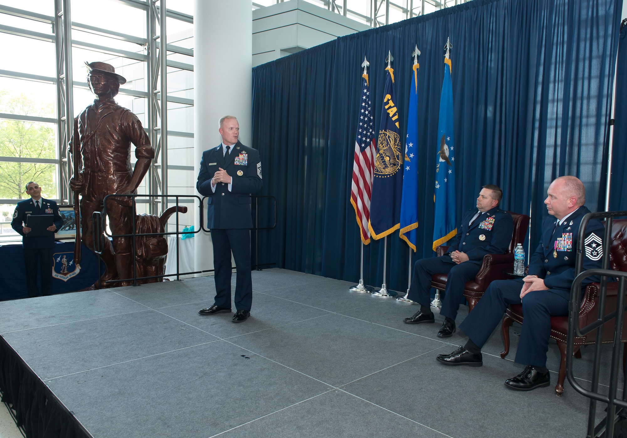 Chief Master Sgt. of the Air Force James A. Cody (center left) delivers remarks during the retirement ceremony of Chief Master Sgt. James W. Hotaling, the 11th command chief master sergeant of the ANG (right). The event was hosted by 1st Lt. Charles V. Bland, a budget officer for the 105th Airlift Wing at Stewart ANG Base, Newburgh, New York. (U.S. Air National Guard photo by Master Sgt. Marvin R. Preston/Released)