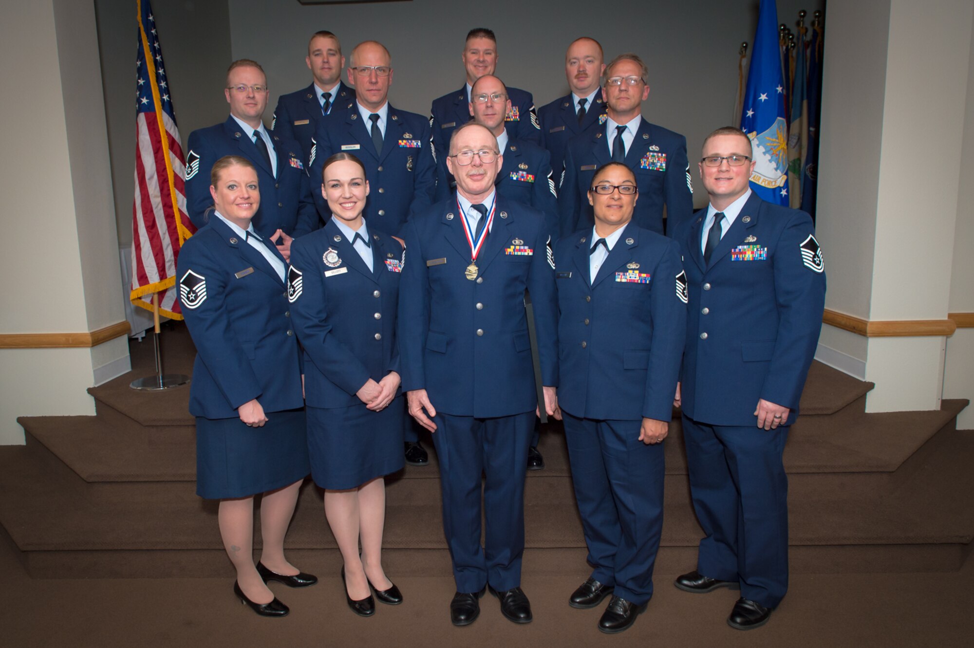 U.S. Air Force airmen with the 153rd Airlift Wing, Wyoming Air National Guard, pose for a picture, May 15, 2016 at F.E. Warren AFB in Cheyenne, Wyoming. The airmen were recognized as recent inductees at the Senior NCO rank. (U.S Air National Guard photo by Master Sgt. Charles Delano/released)