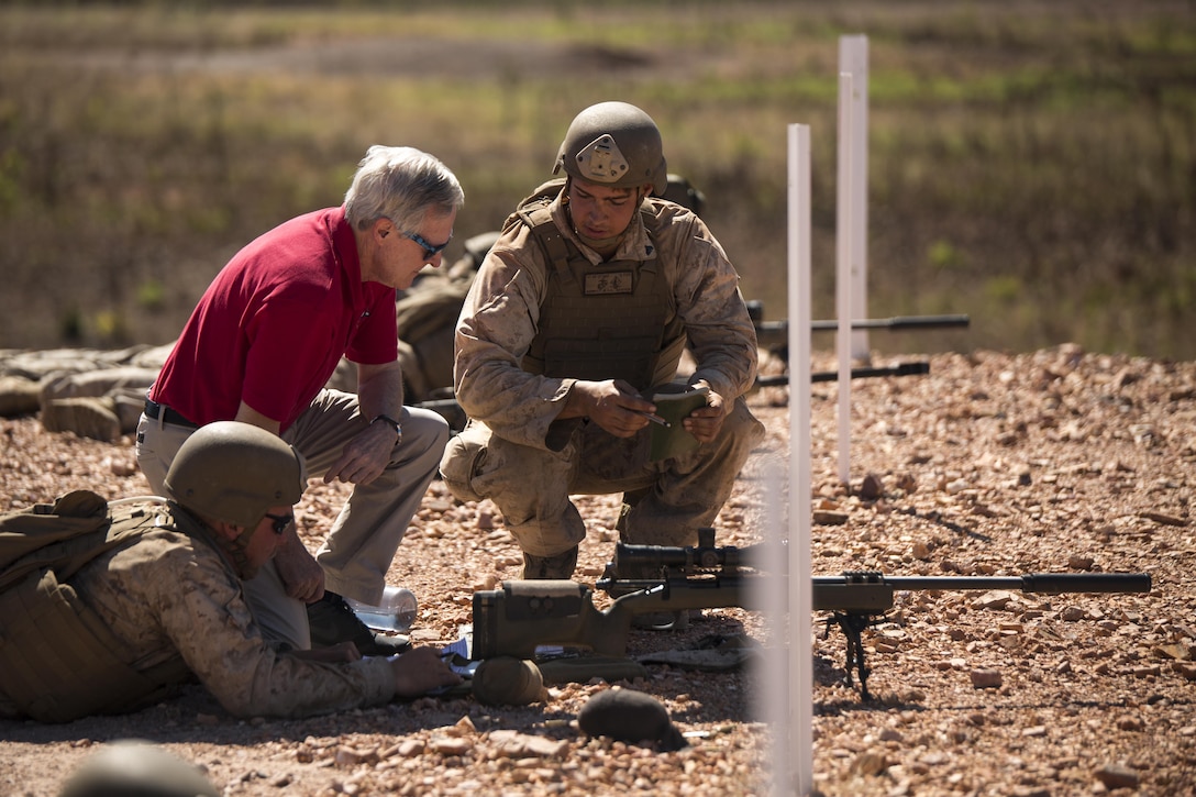 Cpl. Chance A. Benedict Jr., a mortarman, talks to Ray Mabus, Secretary of the Navy, about the M40A5 sniper rifle at Mount Bundey Training Area, Northern Territory, Australia, May 14, 2016. Mabus came to Australia to visit the Marines and Sailors of Marine Rotational Force – Darwin and observe live-fire ranges. Benedict is with 1st Battalion, 1st Marine Regiment, MRF-D. 