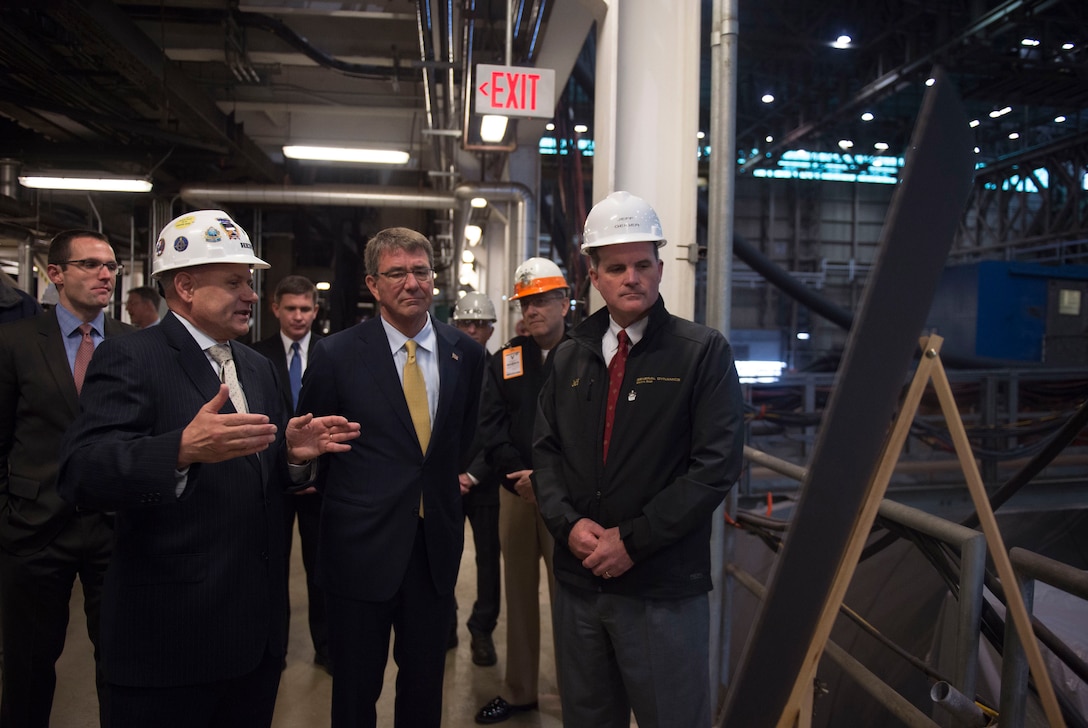 Executives brief Defense Secretary Ash Carter during an electric boat facility tour in Groton, Conn., May 24, 2016. DoD photo by Air Force Senior Master Sgt. Adrian Cadiz