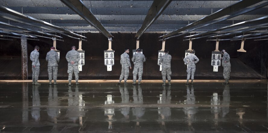 Airmen check their scores during the 2016 Elementary Level Excellence in Competition Rifle Match at Joint Base Andrews, Md., May 17. The EIC had 120 participants from active duty, the Guard and Reserve, and was one of several events on base celebrating National Police Week. (U.S. Air Force photo by Airman 1st Class Philip Bryant)