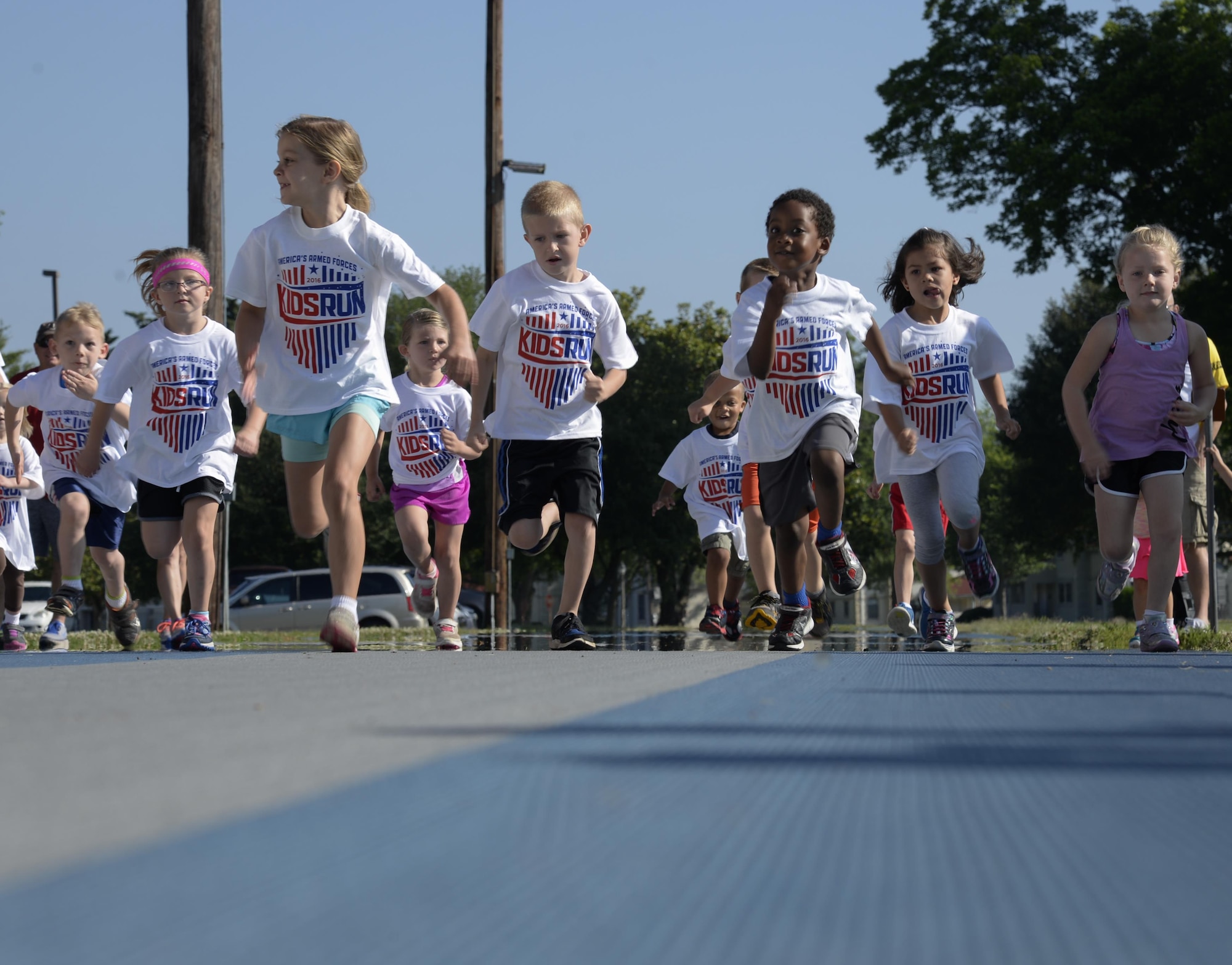 Team Barksdale youth begin a race at Barksdale Air Force Base, La., May 21, 2016. The Youth Center event, Armed Forces Kid’s Run, was offered to all and was modified for different age groups. (U.S. Air Force photo/Airman 1st Class Stuart Bright)