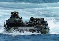 100713-N-8069G-223 USS CARTER HALL, AT SEA  (July 13, 2010)  --  An amphibious assault vehicle (AAV) approaches amphibious dock landing ship USS Carter Hall (LSD 50).  Carter Hall is part of the Kearsarge Amphibious Ready Group (ARG) which is participating in a Composite Unit Training Exercise (COMPTUEX) off the East Coast of the United States, from Virginia to Florida. . The Navy engineers developing a new Extreme Power Internal Combustion (EPIC) engine to transform Amphibious Combat Vehicle (ACV) capabilities were recognized for their EPIC innovation in the Naval Surface Warfare Center Dahlgren Division (NSWCDD) annual awards program, May 18. EPIC is designed to increase power and reduce weight to achieve high water speed for future Marine Corps ACVs.  The engine's fuel efficiency can also support long term ACV ground operations. EPIC inventor, Greg Buchanan, and developer, Vincent Vendetti, were among a team of engineers winning the Naval Sea System Command 2016 Commander's Innovation Award for the innovation. "Our team has the initiative, drive, creativity, ingenuity, and experience to bring this game-changing, mission transformational technology to reality," said Buchanan. "Combined with the rapid prototyping, additive manufacturing, and innovation design capabilities of the collaborating warfare centers, we will bring this engine's decisive advantage to the warfighter."  
