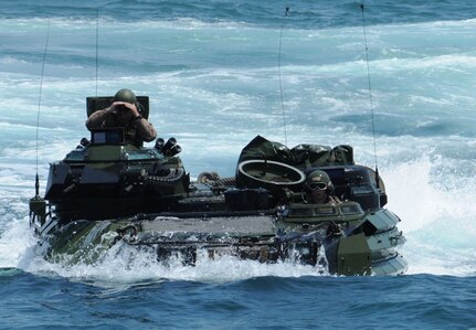 100713-N-8069G-223 USS CARTER HALL, AT SEA  (July 13, 2010)  --  An amphibious assault vehicle (AAV) approaches amphibious dock landing ship USS Carter Hall (LSD 50).  Carter Hall is part of the Kearsarge Amphibious Ready Group (ARG) which is participating in a Composite Unit Training Exercise (COMPTUEX) off the East Coast of the United States, from Virginia to Florida. . The Navy engineers developing a new Extreme Power Internal Combustion (EPIC) engine to transform Amphibious Combat Vehicle (ACV) capabilities were recognized for their EPIC innovation in the Naval Surface Warfare Center Dahlgren Division (NSWCDD) annual awards program, May 18. EPIC is designed to increase power and reduce weight to achieve high water speed for future Marine Corps ACVs.  The engine's fuel efficiency can also support long term ACV ground operations. EPIC inventor, Greg Buchanan, and developer, Vincent Vendetti, were among a team of engineers winning the Naval Sea System Command 2016 Commander's Innovation Award for the innovation. "Our team has the initiative, drive, creativity, ingenuity, and experience to bring this game-changing, mission transformational technology to reality," said Buchanan. "Combined with the rapid prototyping, additive manufacturing, and innovation design capabilities of the collaborating warfare centers, we will bring this engine's decisive advantage to the warfighter."  