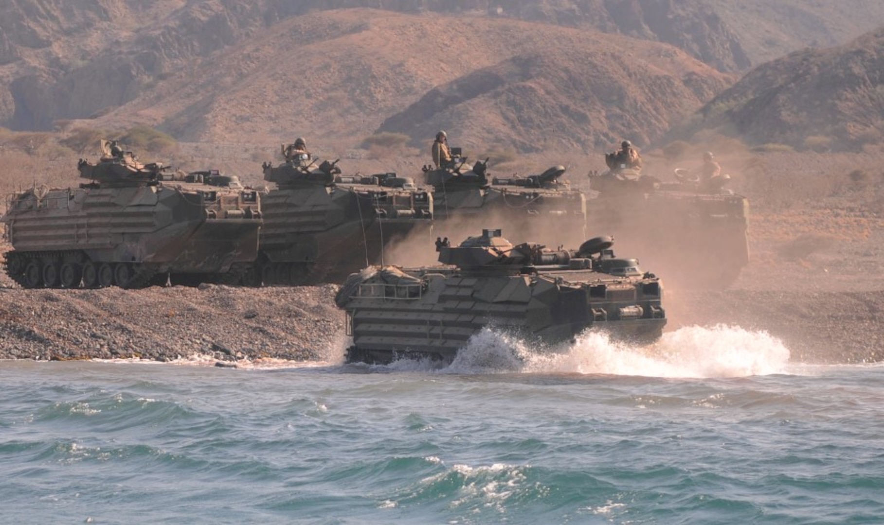 101102-N-8069G-169 GULF OF ADEN (Nov. 2, 2010) Marines embarked on USS Carter Hall (LSD 50), and assigned to 26th Marine Expeditionary Unit, depart the shore in Djibouti in an amphibious assault vehicle (AAV) following amphibious training ashore.The Navy engineers developing a new Extreme Power Internal Combustion (EPIC) engine to transform Amphibious Combat Vehicle (ACV) capabilities were recognized for their EPIC innovation in the Naval Surface Warfare Center Dahlgren Division (NSWCDD) annual awards program, May 18. EPIC is designed to increase power and reduce weight to achieve high water speed for future Marine Corps ACVs.  The engine's fuel efficiency can also support long term ACV ground operations. EPIC inventor, Greg Buchanan, and developer, Vincent Vendetti, were among a team of engineers winning the Naval Sea System Command 2016 Commander's Innovation Award for the innovation. "An amphibious combat vehicle featuring the efficient, high-power EPIC engine would meet all challenges and outmaneuver future rivals to truly transform amphibious assault missions," said Vendetti.  