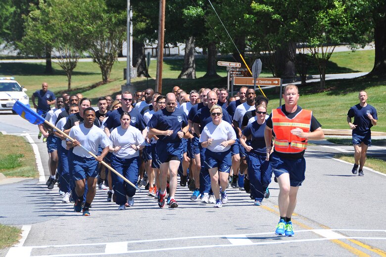 Members of the 80th Aerial Port Squadron participate in the 2nd Annual Port Dawg Memorial Run May 15, 2016 on Dobbins Air Reserve Base, Georgia. The one mile run is in honor of their fallen, both on and off the battlefield. During National Defense Transportation week, aerial port squadrons across the U.S. Air Force take this time to pay respect to those in their career field who have made the ultimate sacrifice. (U.S. Air Force photo/Master Sgt. James Branch)