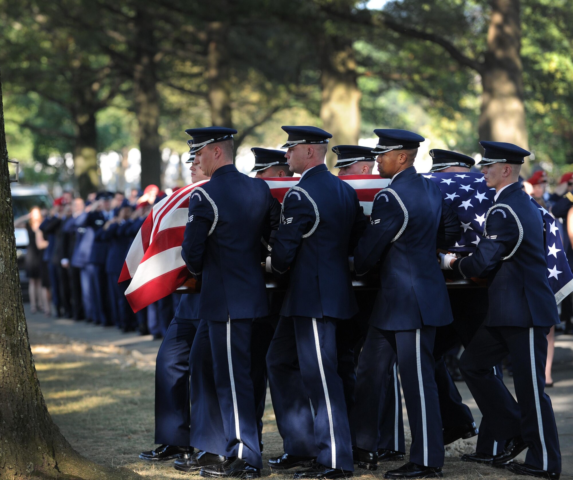 Air Force Honor Guard pallbearers carry the remains of Capt. Matthew Roland to his final resting place at Arlington National Cemetery, Va., Sept. 18, 2015. Roland was fatally wounded in an attack near a vehicle checkpoint at Camp Antonik, a forward operating base in Helmand Province, Afghanistan. Roland was a special tactics officer at the 23rd Special Tactics Squadron, Hurlburt Field, Fla. (U.S. Air Force photo/Staff Sgt. Nichelle Anderson)
