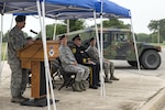 Chief Master Sgt. Mark Hammack, 343rd Training Squadron Security Forces Academy chief enlisted manager, gives a speech during a ceremony in recognition of National Police Week at Joint Base San Antonio-Randolph’s Heritage Park May 17, 2016. National Police Week began in 1962 after President John F. Kennedy signed a proclamation designating May 15 as Peace Officers Memorial Day and the week in which that date falls as Police Week. (U.S. Air Force photo by Airman First Class Lauren Ely/RELEASED)