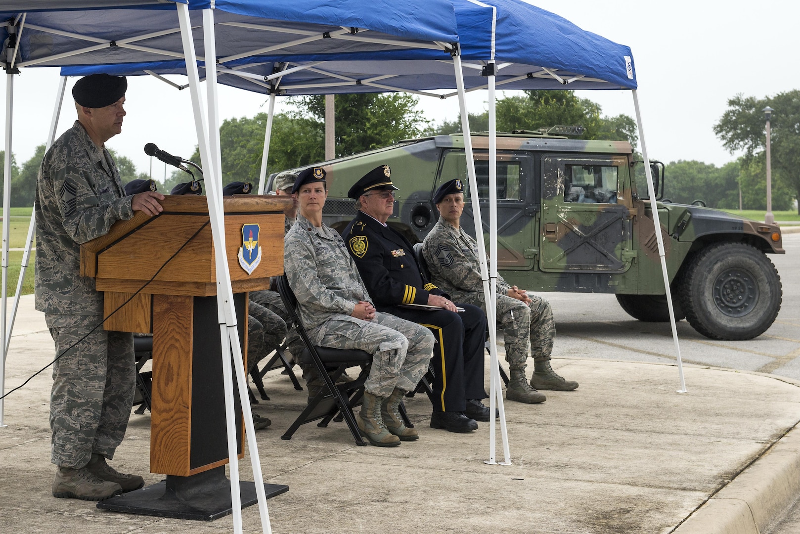 Chief Master Sgt. Mark Hammack, 343rd Training Squadron Security Forces Academy chief enlisted manager, gives a speech during a ceremony in recognition of National Police Week at Joint Base San Antonio-Randolph’s Heritage Park May 17, 2016. National Police Week began in 1962 after President John F. Kennedy signed a proclamation designating May 15 as Peace Officers Memorial Day and the week in which that date falls as Police Week. (U.S. Air Force photo by Airman First Class Lauren Ely/RELEASED)