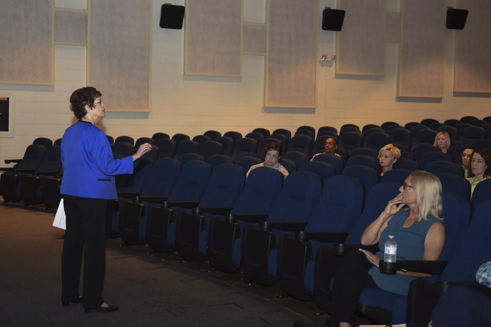 Dr. Gail Wallen, director of Holocaust Services for Tucson, Ariz, speaks to a group about the history of the Holocaust at the Base Theater on Goodfellow Air Force Base, Texas, May 24, 2016. Wallen talked about the events that led to the Holocaust. (U.S. Air Force photo by Airman 1st Class Chase Sousa/Released)