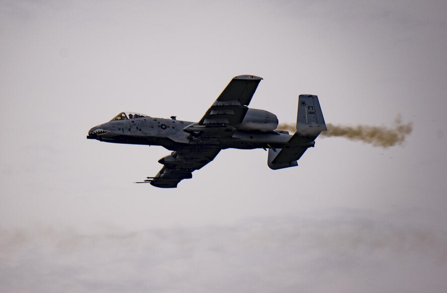 An A-10C Thunderbolt II fires munitions over Grand Bay Bombing and Gunnery Range at Moody Air Force Base, Ga., May 20, 2016. During the training, the aircraft conducted tactical air and ground maneuvers, as well as weapons training. (U.S. Air Force photo by Tech. Sgt. Zachary Wolf/Released)