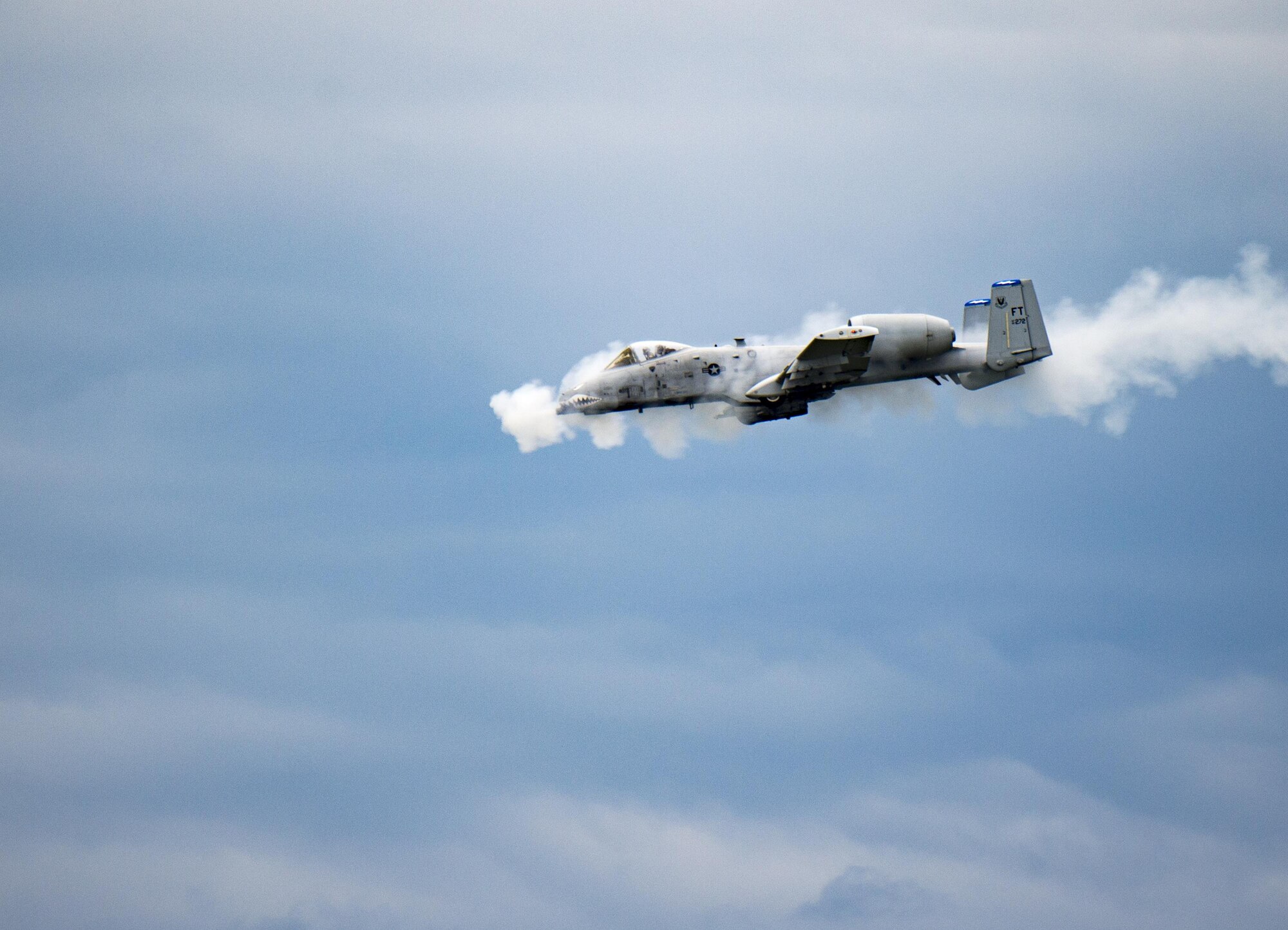 An A-10 Thunderbolt II fires the GAU-8 Avenger, a 30mm Gatling-style canon, over the Grand Bay Bombing and Gunnery Range at Moody Air Force Base, Ga., May 20, 2016. A-10s are used when calls for close air support with the capability to fire rockets, drop bombs or suppress the enemy with the 30mm cannon mounted on the nose of the aircraft. (U.S. Air Force photo by Tech. Sgt. Zachary Wolf/Released)
