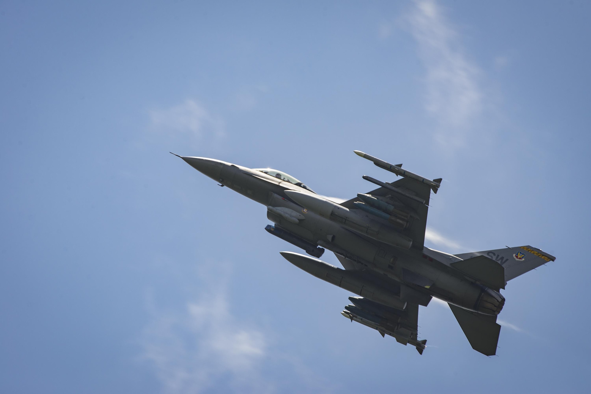 An F-16 Fighting Falcon asends over Grand Bay Bombing and Gunnery Range at Moody Air Force Base, Ga., May 19, 2016. Multiple U.S. Air Force aircraft within Air Combat Command conducted joint aerial training showcasing the aircraft’s tactical air and ground maneuvers, as well as its weapons capabilities. (U.S. Air Force photo by Airman Daniel Snider/Released)