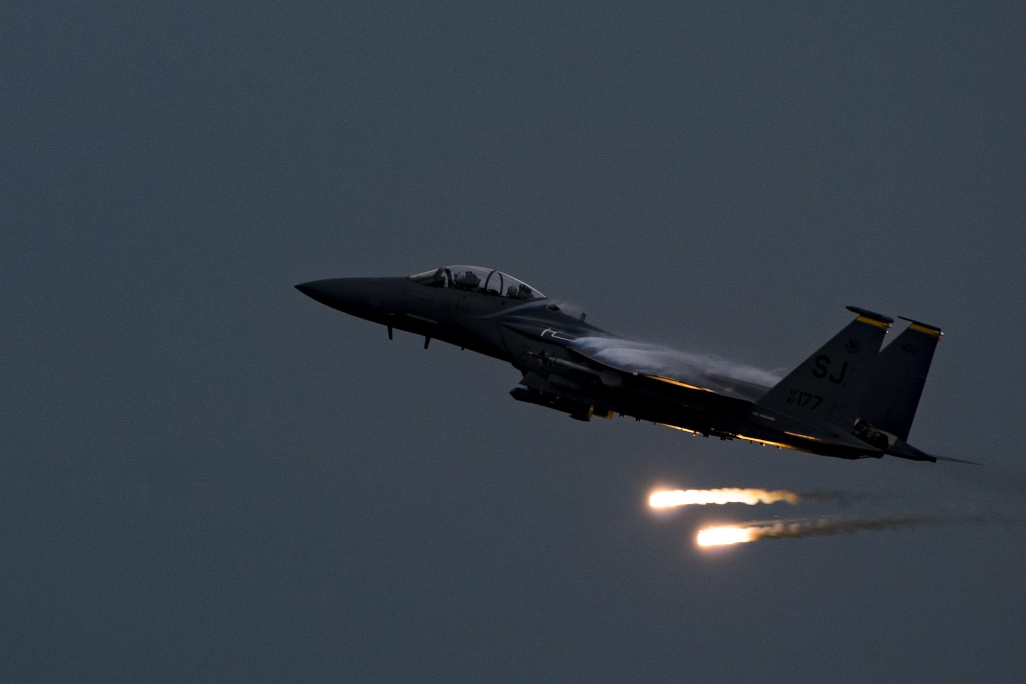 An F-15E Strike Eagle fires flares over Grand Bay Bombing and Gunnery Range at Moody Air Force Base, Ga., May 20, 2016. The F-15 participated in training in which multiple Air Combat Command aircraft conducted tactical air and ground maneuvers. (U.S. Air Force photo by Airman Daniel Snider/Released)