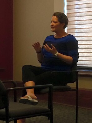 Laura Markuly, a 349th Air Refueling Squadron administration assistant, speaks to an audience about her experience with breast cancer April 21, 2016, in Cheney, Kan. Markuly’s positive outlook and determination has helped her overcome the difficulties of breast cancer, and now she strives to support others during their hardships. (Courtesy photo)