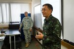 Royal Thai Army Lt. Col. Minwong Sitthisak, explosive ordnance disposal (EOD) Bangkok deputy commander, teaches the classroom portion of a counter-improvised explosive device (C-IED) train the trainer course May 10, 2016, at Schofield Barracks, Hawaii. Military members of the U.S. Army, Royal Thai Army, Bangladesh Army, and Air National Guard shared experiences and knowledge throughout the class to advance their C-IED skills and build partnerships. The train the trainer course (T3) was hosted by the U.S. Army Pacific’s Asia Pacific Counter-Improvised Explosive Device Fusion Center. 