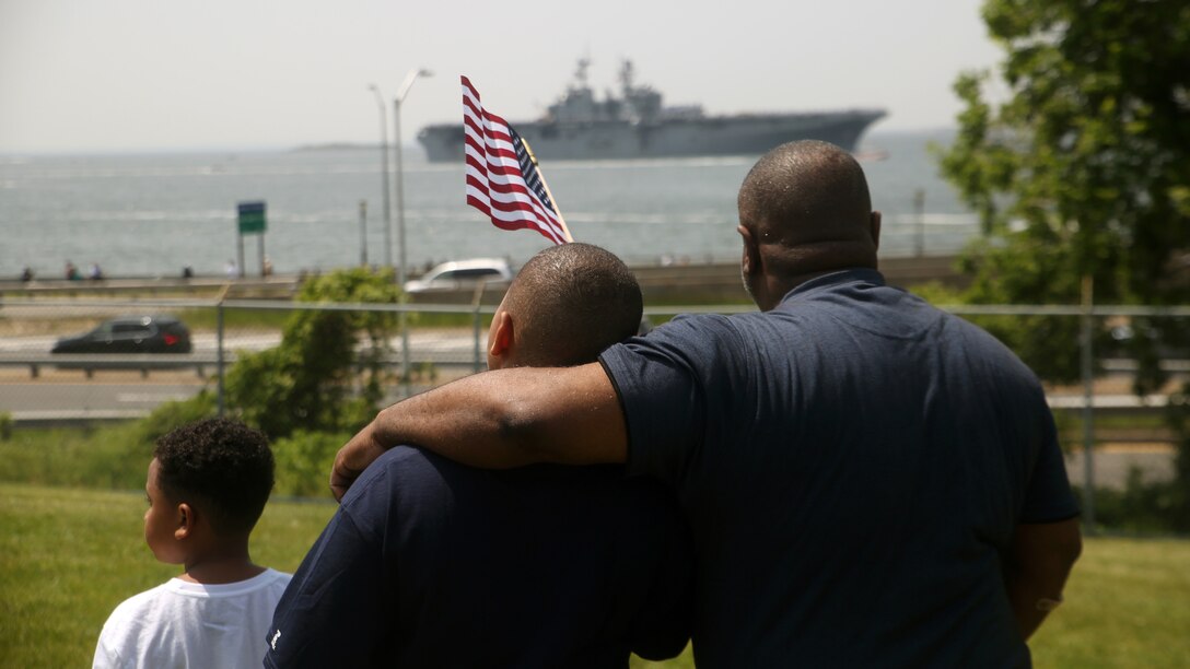 Supporters of the U.S. military gather at Fort Hamilton, Brooklyn, New York, to watch the Parade of Ships, May 25, 2016.  The Parade of Ships marks the beginning of the 28th Annual Fleet Week New York. More than 10 Navy ships and Coast Guard cutters will be docked in the city for this year’s Fleet Week.