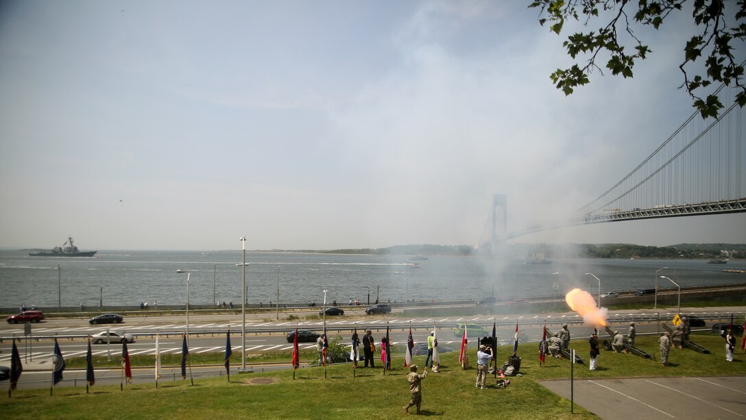 U.S. Army soldiers stationed at Fort Hamilton, Brooklyn, New York, fire cannons during a 21-gun salute to the U.S. Navy ships as they enter the New York City’s harbor during the Parade of Ships, May 25, 2016. The firing of the cannons is a tradition the Army does annually as a way to welcome the sea services to New York. 