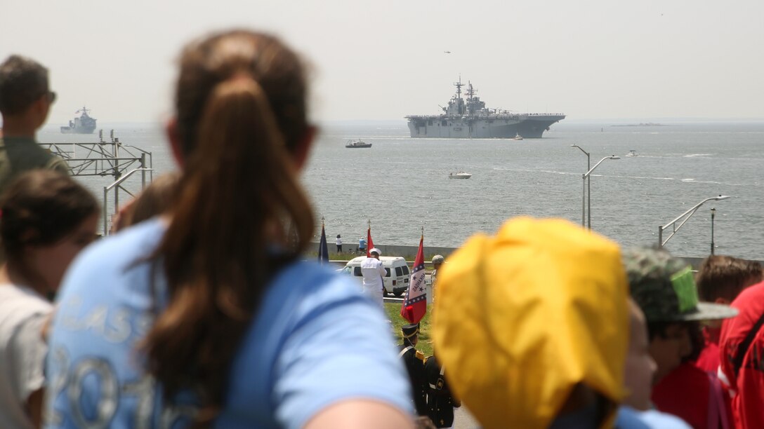 Supporters of the U.S. military gather at Fort Hamilton, Brooklyn, New York, to watch the Parade of Ships, May 25, 2016.  The Parade of Ships marks the beginning of the 28th Annual Fleet Week New York. More than 10 Navy ships and Coast Guard cutters will be docked in the city for this year’s Fleet Week. 