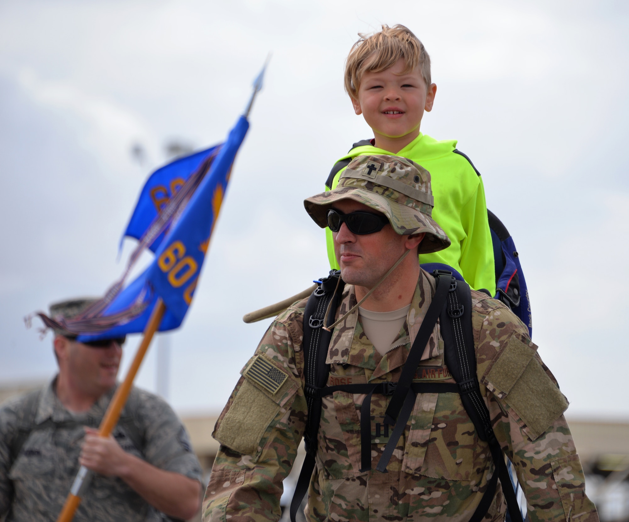 Chaplain (Capt.) Robert Rose, 60th Air Mobility Wing chaplain, participates in the Gold Star Families Ruck March at Travis Air Force Base, Calif., May 21, 2016. Approximately 200 service members participated in the sixth annual GSFRM, honoring the more than 45 Gold Star family members who were in attendance. (U.S. Air Force photo by Staff Sgt. Charles Rivezzo)